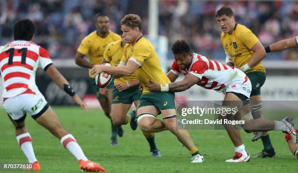 Michael Hooper of Australia charges upfield during the rugby union international match between Japan and Australia Wallabies at Nissan Stadium on...