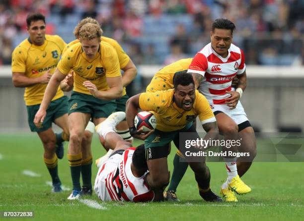 Samu Kerevi of Australia takes on the Japan defence during the rugby union international match between Japan and Australia Wallabies at Nissan...