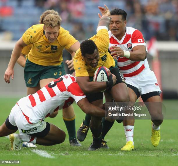 Samu Kerevi of Australia takes on the Japan defence during the rugby union international match between Japan and Australia Wallabies at Nissan...