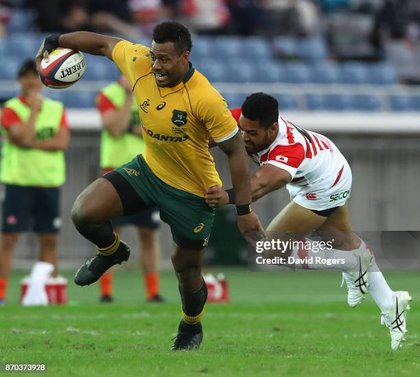 Samu Kerevi of Australia breaks with the ball during the rugby union international match between Japan and Australia Wallabies at Nissan Stadium on...