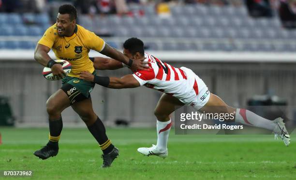 Samu Kerevi of Australia breaks with the ball during the rugby union international match between Japan and Australia Wallabies at Nissan Stadium on...