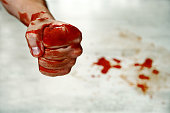 Fists with blood.