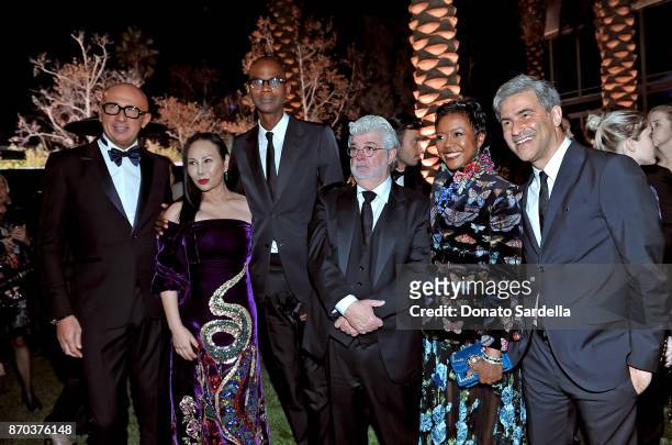 Gucci CEO Marco Bizzarri, co-host Eva Chow, wearing Gucci, honoree Mark Bradford, wearing Gucci; honoree George Lucas, Mellody Hobson and LACMA CEO...