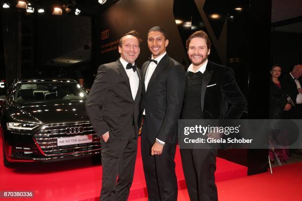 Wotan Wilke-Moehring, Andreas Bourani and Daniel Bruehl during the 24th Opera Gala benefit to Deutsche Aids-Stiftung at Deutsche Oper Berlin on...