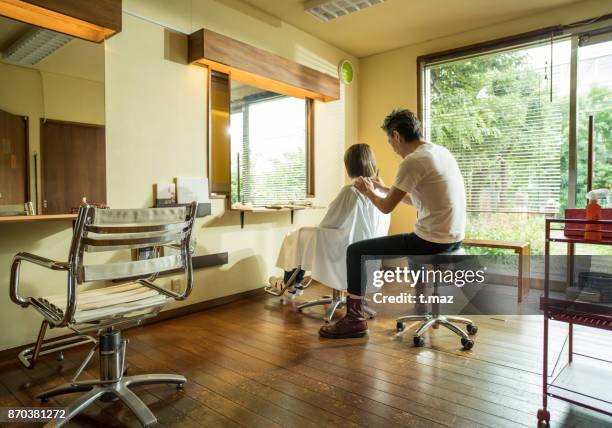 hair stylist's father and his daughter - t maz stock pictures, royalty-free photos & images