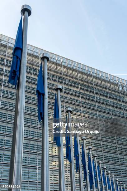 european union flags at berlaymont building of the european commission - european union symbol stock pictures, royalty-free photos & images