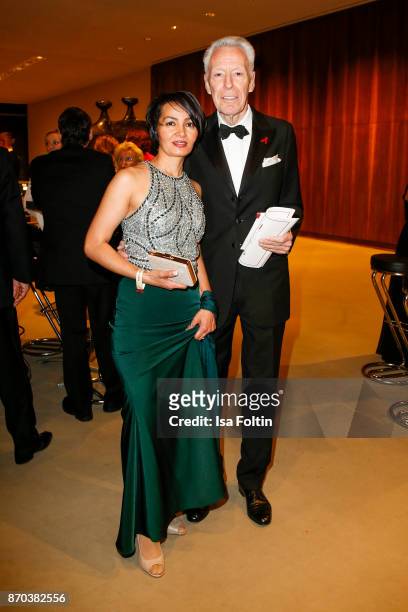 German author Egon F. Freiheit and his girlfriend Amira during the 24th Opera Gala at Deutsche Oper Berlin on November 4, 2017 in Berlin, Germany.