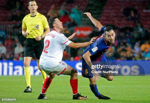 Sebastien Corchia and Sergio Busquets during La Liga match between FC Barcelona v Sevilla CF, in Barcelona, on November 04, 2017.