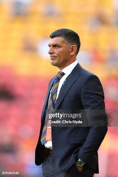 Roar coacj John Aloisi looks on during the round five A-League match between the Brisbane Roar and the Central Coast Mariners at Suncorp Stadium on...