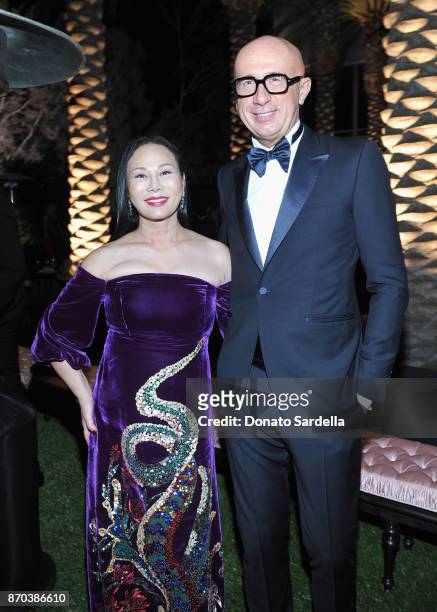 Art+Film Gala Co-Chair Eva Chow , wearing Gucci, and CEO of Gucci Marco Bizzarri attend the 2017 LACMA Art + Film Gala Honoring Mark Bradford and...