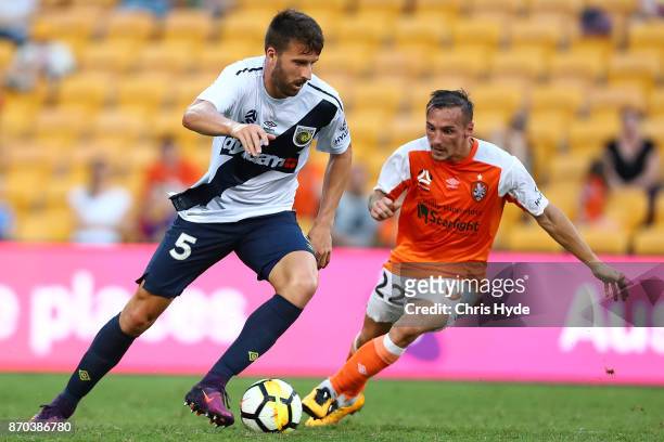 Anthony Golec of the Mariners kicks during the round five A-League match between the Brisbane Roar and the Central Coast Mariners at Suncorp Stadium...