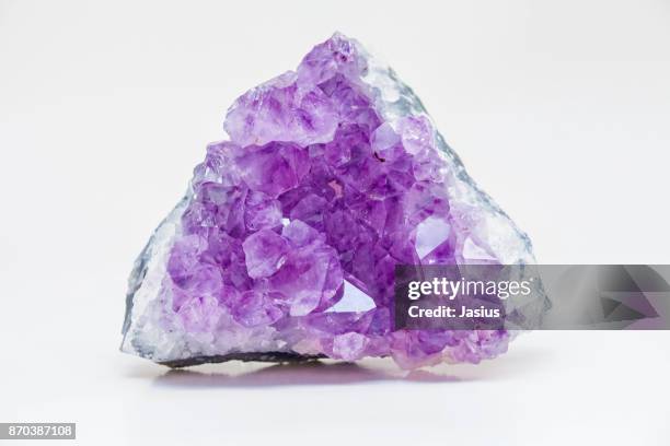 rock mineral macro photo with white background - amethyst stock pictures, royalty-free photos & images