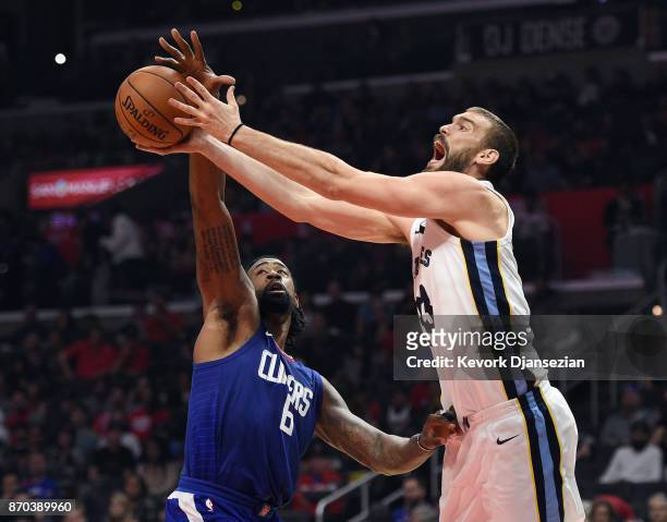 DeAndre Jordan of the Los Angeles Clippers knocks the ball out of the hands of Marc Gasol of the Memphis Grizzlies during the first half of the...