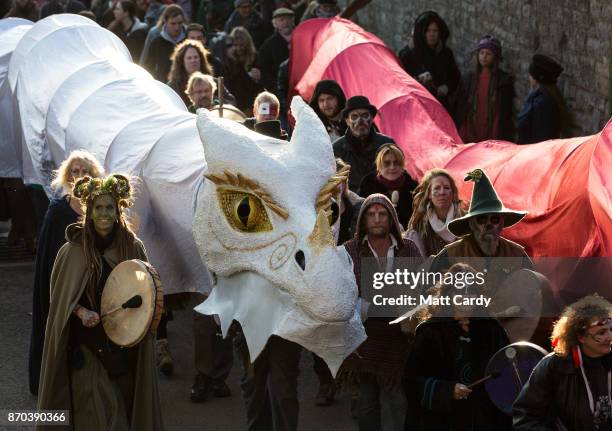 The Glastonbury Dragons are paraded through the town as they celebrate Samhain at the Glastonbury Dragons Samhain Wild Hunt 2017 in Glastonbury on...