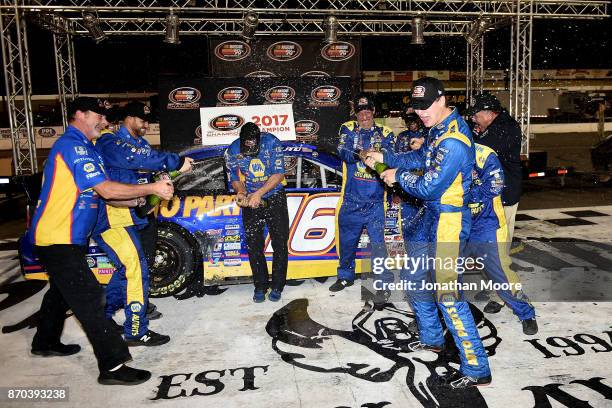 Todd Gilliland, driver of the NAPA Auto Parts Toyota, celebrates in victory lane after being named 2017 NASCAR K&N Pro Series West 2017 Champion...