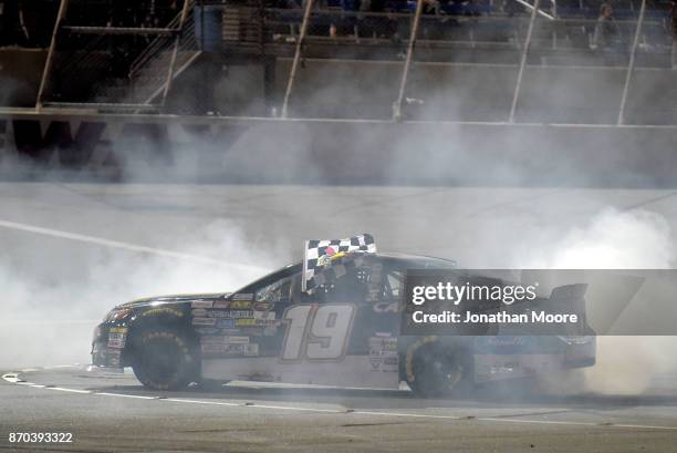 Derek Kraus, driver of the Carlyle Tools Toyota, celebrates with a burnout after winning the NASCAR K&N Pro Series West Coast Stock Car Hall of Fame...
