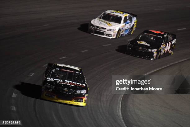 Bill Kann, driver of the Kevin Grover GMC Toyota, races on track during the NASCAR K&N Pro Series West Coast Stock Car Hall of Fame Championship 150,...