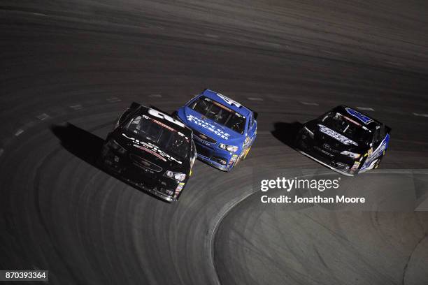 Blaine Perkins, driver of the Four Star Fruit Chevrolet, races on track during the NASCAR K&N Pro Series West Coast Stock Car Hall of Fame...