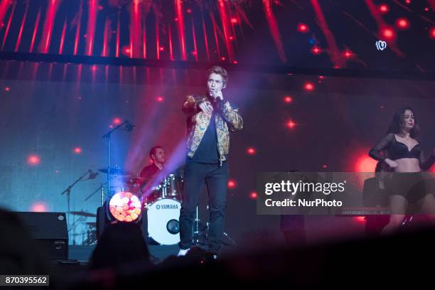 Carlos Baute performs during the concert &quot;Cadena 100 por Ellas&quot; whose benefits go to the Spanish Association Against Cancer for the fight...