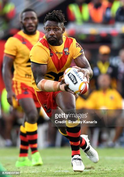 James Segeyaro of Papua New Guinea runs with the ball during the 2017 Rugby League World Cup match between Papua New Guinea Kumuls and Ireland on...
