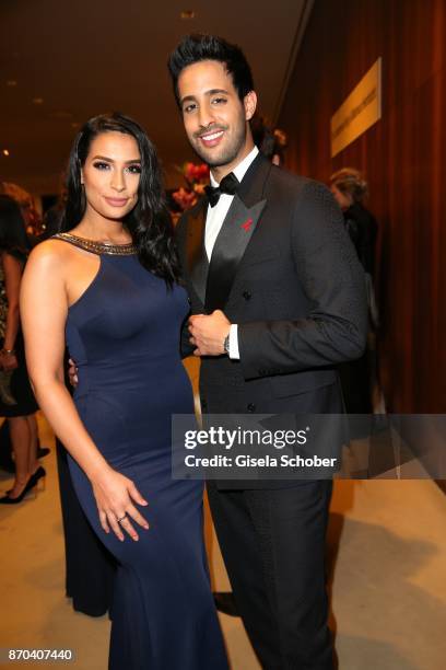 Sami Slimani and his sister Lamiya Slimani during the 24th Opera Gala benefit to Deutsche Aids-Stiftung at Deutsche Oper Berlin on November 4, 2017...