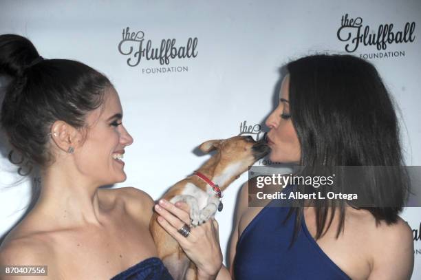 Tiffany Michelle and Emmanuelle Vaugier with Kismet at The 2017 Fluffball held at Lombardi House on November 4, 2017 in Los Angeles, California.