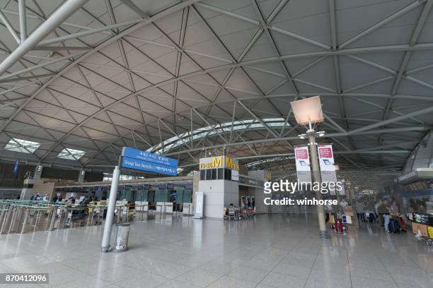 incheon international airport in south korea - incheon international airport stock pictures, royalty-free photos & images