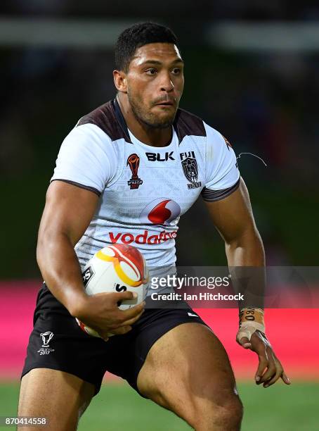 Taane Milne of Fiji runs the ball during the 2017 Rugby League World Cup match between Fiji and Wales at 1300SMILES Stadium on November 5, 2017 in...