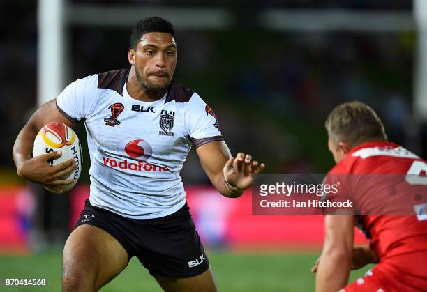 Taane Milne of Fiji looks to get past Christiaan Roets of Walesduring the 2017 Rugby League World Cup match between Fiji and Wales at 1300SMILES...