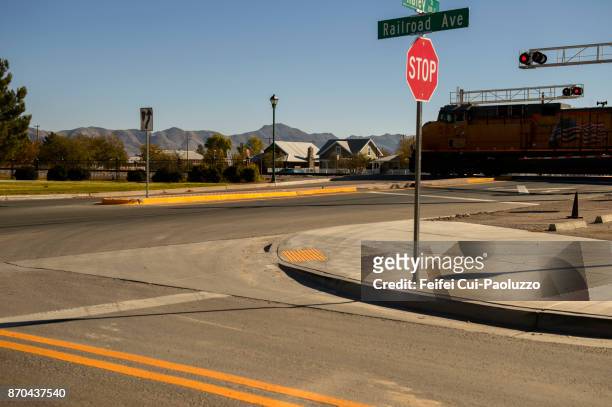 road sign and city street of willcox, arizona, usa - traffic light empty road stock pictures, royalty-free photos & images