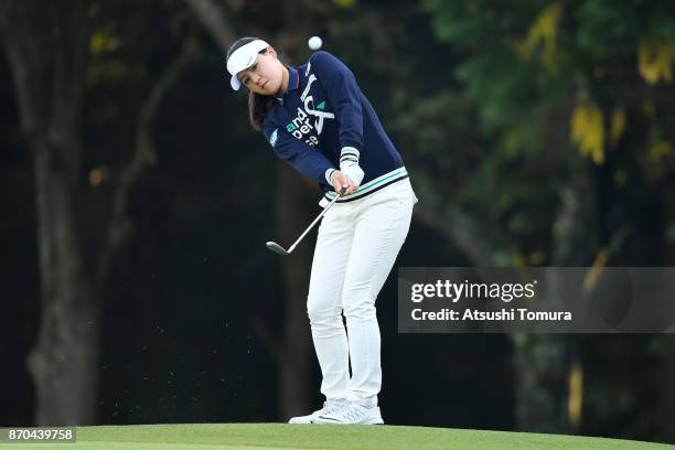 In Gee Chun of South Korea chips onto the 1st green during the final round of the TOTO Japan Classics 2017 at the Taiheiyo Club Minori Course on...