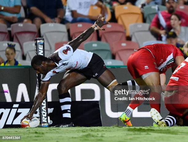 Suliasi Vunivalu of Fiji scores a try during the 2017 Rugby League World Cup match between Fiji and Wales at 1300SMILES Stadium on November 5, 2017...