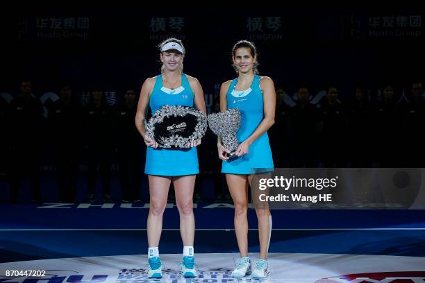 Winner Julia Goerges of Germany and runner-up Coco Vandeweghe of USA pose with their trophies following the Ladies singles final on day 6 WTA Elite...