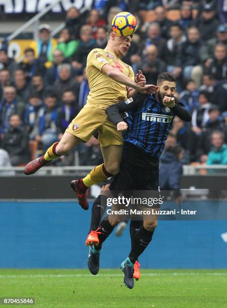 Roberto Gagliardini of FC Internazionale competes for the ball with Andrea Belotti of Torino FC during the Serie A match between FC Internazionale...