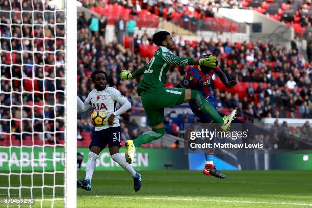 Mamadou Sakho of Crystal Palace attempts to head the ball as Paulo Gazzaniga of Tottenham Hotspur attempts to save during the Premier League match...