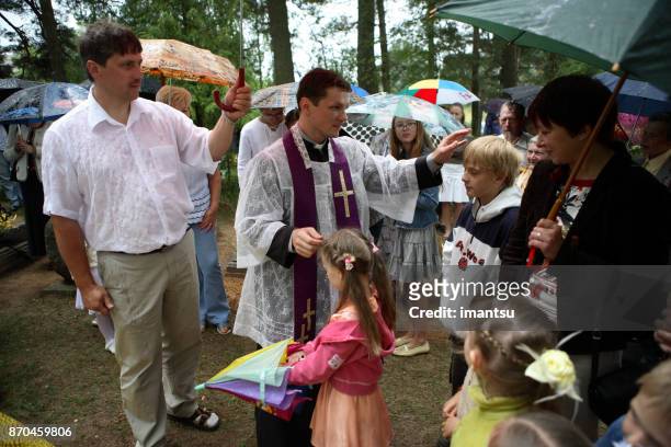 religious grave festival in the latvian region of latgale - pastor stock pictures, royalty-free photos & images