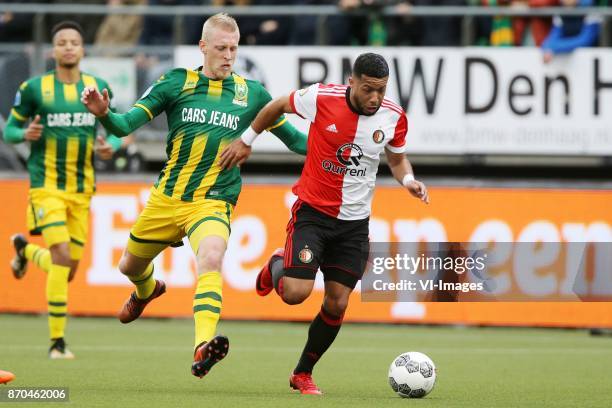 Lex Immers of ADO Den Haag, Tonny Vilhena of Feyenoord during the Dutch Eredivisie match between ADO Den Haag and Feyenoord Rotterdam at Cars Jeans...