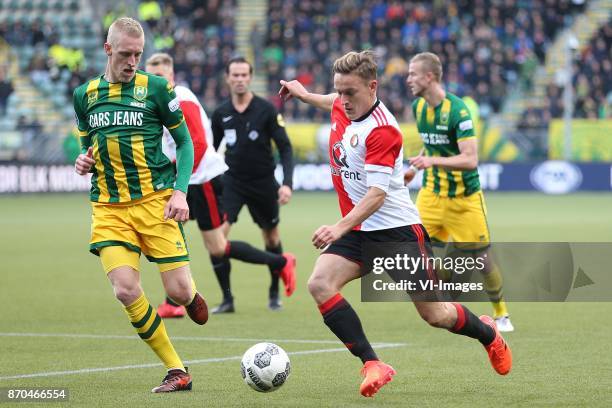 Lex Immers of ADO Den Haag, Jens Toornstra of Feyenoord during the Dutch Eredivisie match between ADO Den Haag and Feyenoord Rotterdam at Cars Jeans...