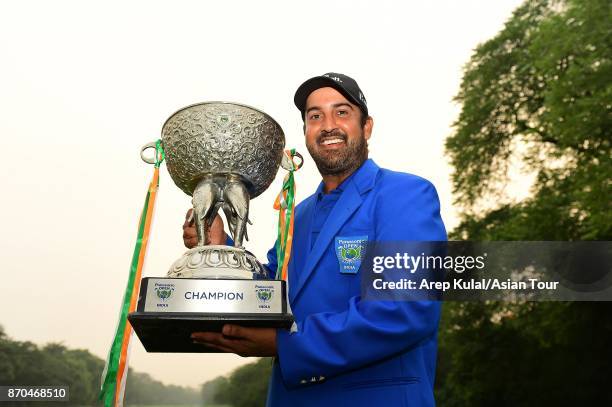 Shiv Kapur of India pose with the trophy after winning the Panasonic Open India at Delhi Golf Club on November 5, 2017 in New Delhi, India.
