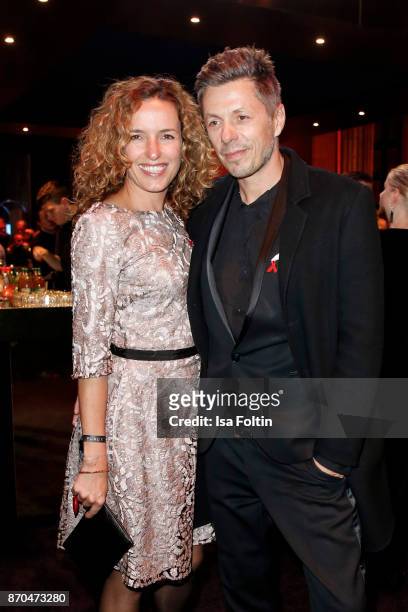 And singer Michi Beck and his wife Ulrike Fleischer attend the aftershow party during during the 24th Opera Gala at Deutsche Oper Berlin on November...