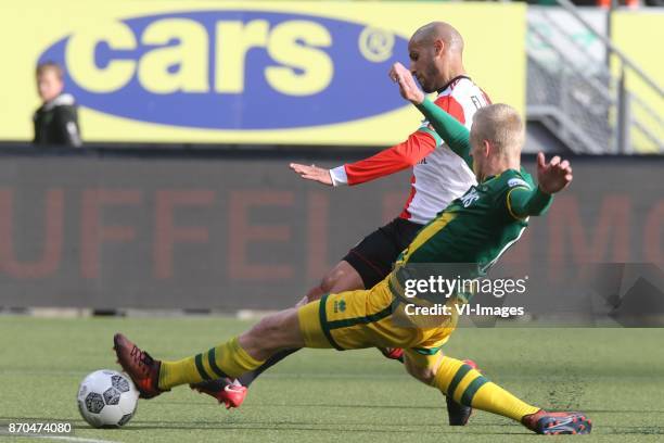 Karim El Ahmadi of Feyenoord, Lex Immers of ADO Den Haag during the Dutch Eredivisie match between ADO Den Haag and Feyenoord Rotterdam at Cars Jeans...