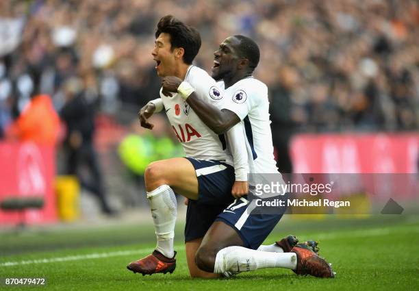 Heung-Min Son of Tottenham Hotspur celebrates scoring his sides first goal with Moussa Sissoko of Tottenham Hotspur during the Premier League match...