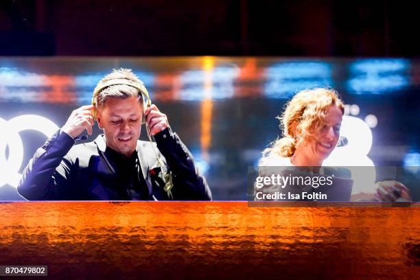 And singer Michi Beck and his wife Ulrike Fleischer as DJ Tean 'Beck to Beck' during the aftershow party during during the 24th Opera Gala at...