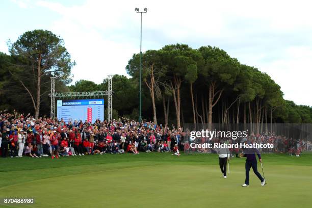 Justin Rose of England celebrates a birdie on the 18th green during the final round of the Turkish Airlines Open at the Regnum Carya Golf & Spa...