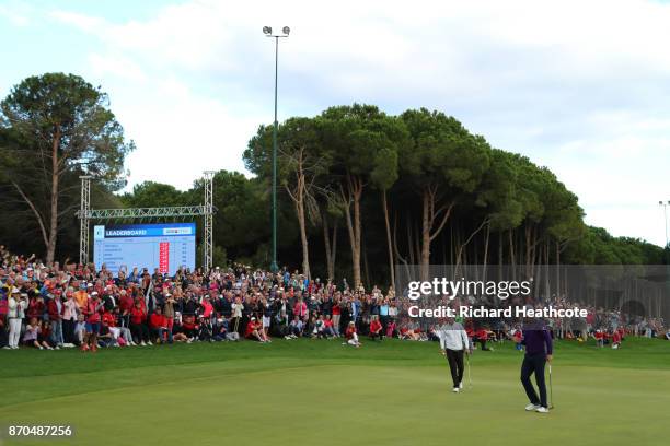 Justin Rose of England celebrates a birdie on the 18th green during the final round of the Turkish Airlines Open at the Regnum Carya Golf & Spa...