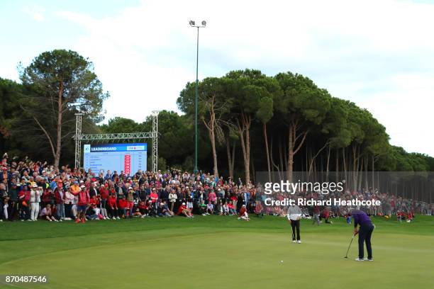 Justin Rose of England putts for birdie on the 18th green during the final round of the Turkish Airlines Open at the Regnum Carya Golf & Spa Resort...