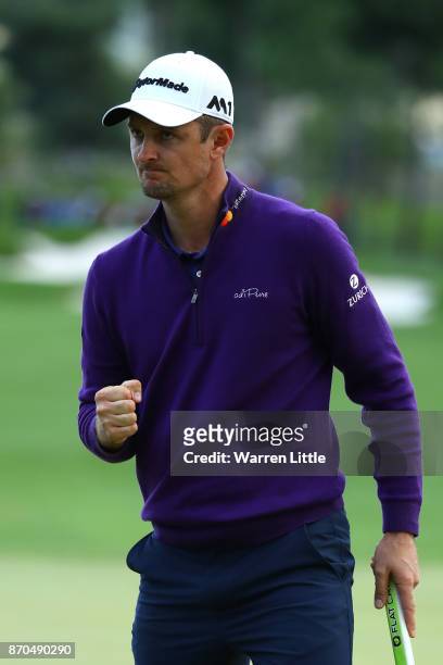Justin Rose of England celebrates a birdie on the 18th green during the final round of the Turkish Airlines Open at the Regnum Carya Golf & Spa...