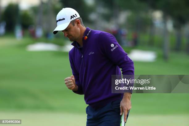 Justin Rose of England celebrates a birdie on the 18th green during the final round of the Turkish Airlines Open at the Regnum Carya Golf & Spa...