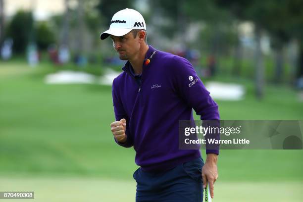 Justin Rose of England celebrates a birdie on the 18th green during the final round of the Turkish Airlines Open at the Regnum Carya Golf & Spa...