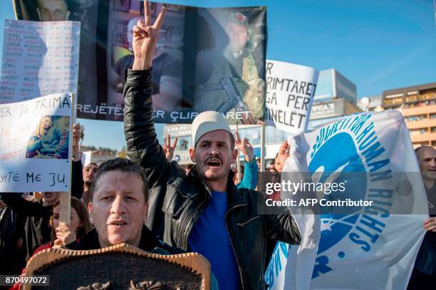 Macedonian Albanians gather in Skopje on November 5 to protest against the verdict of people convicted for plotting attacks and clashing with the...